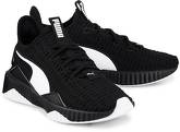 Sneaker Defy Wn´s von Puma in schwarz für Mädchen. Gr. 37,38,38 1/2,40,41